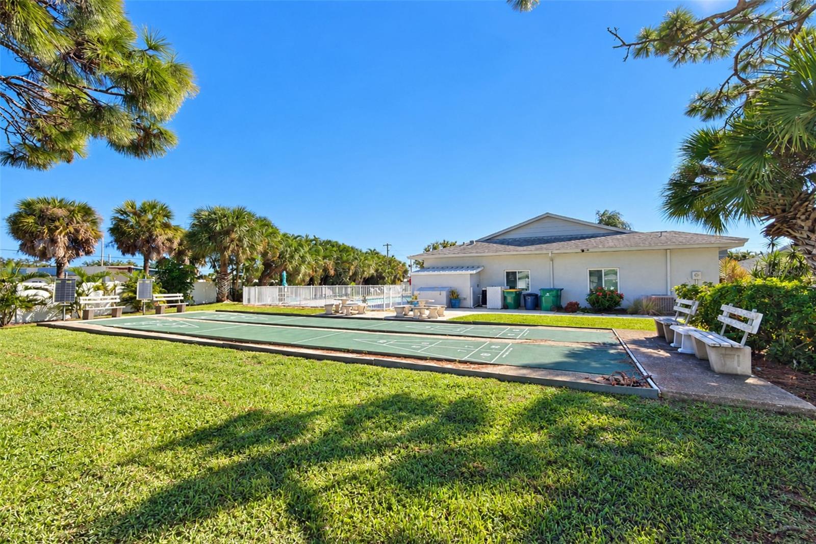 Shuffleboard is conveniently located next to the Clubhouse & pool.