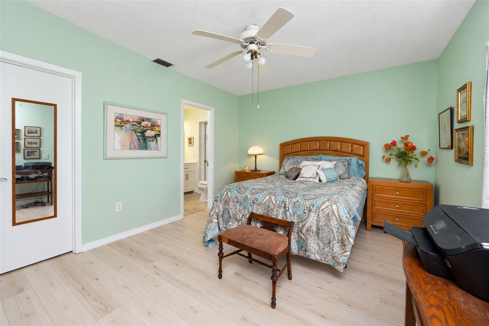 The primary bedroom also features a walk-in closet and ensuite bathroom.