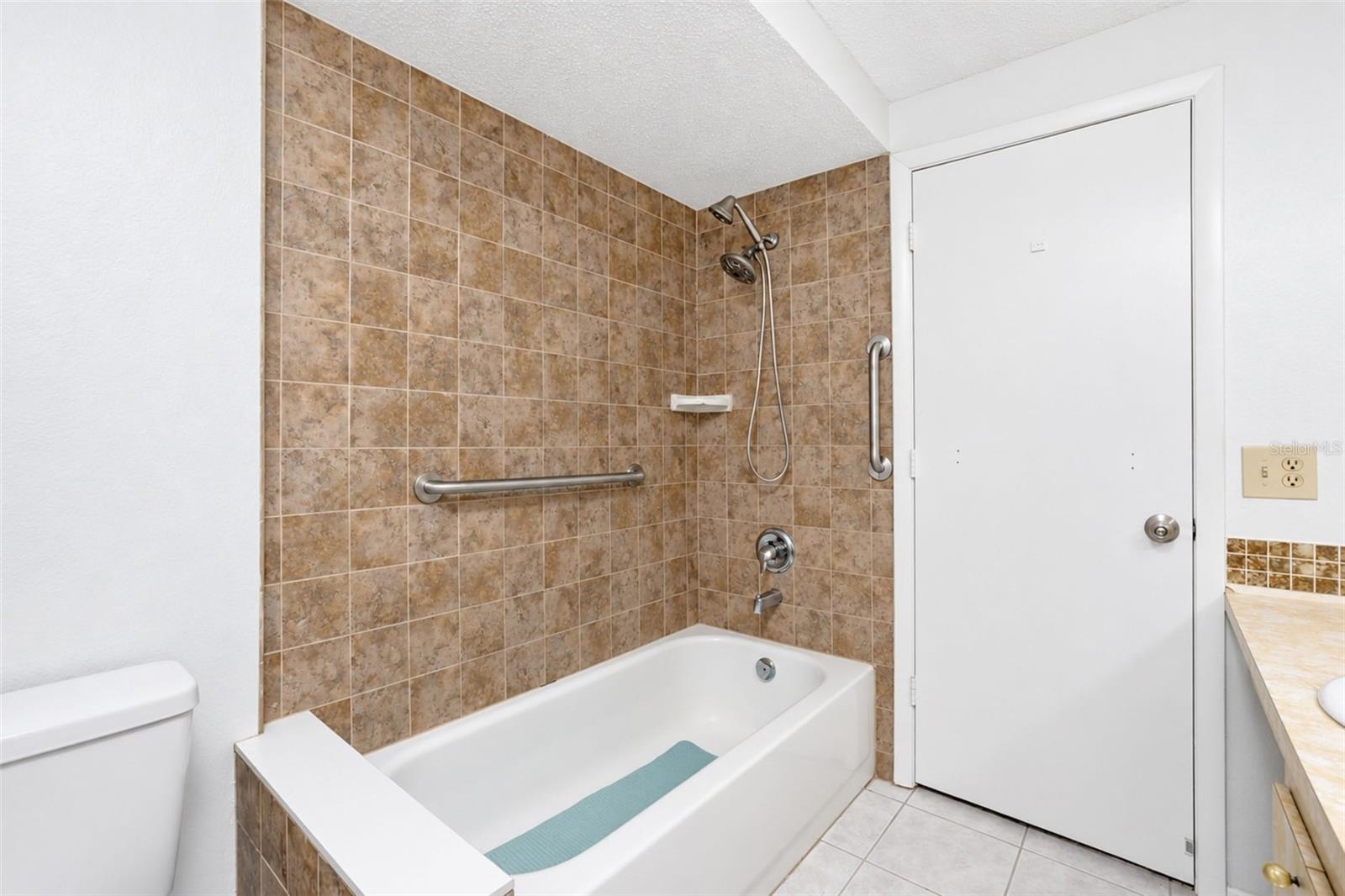Primary bathroom with tub/shower combo