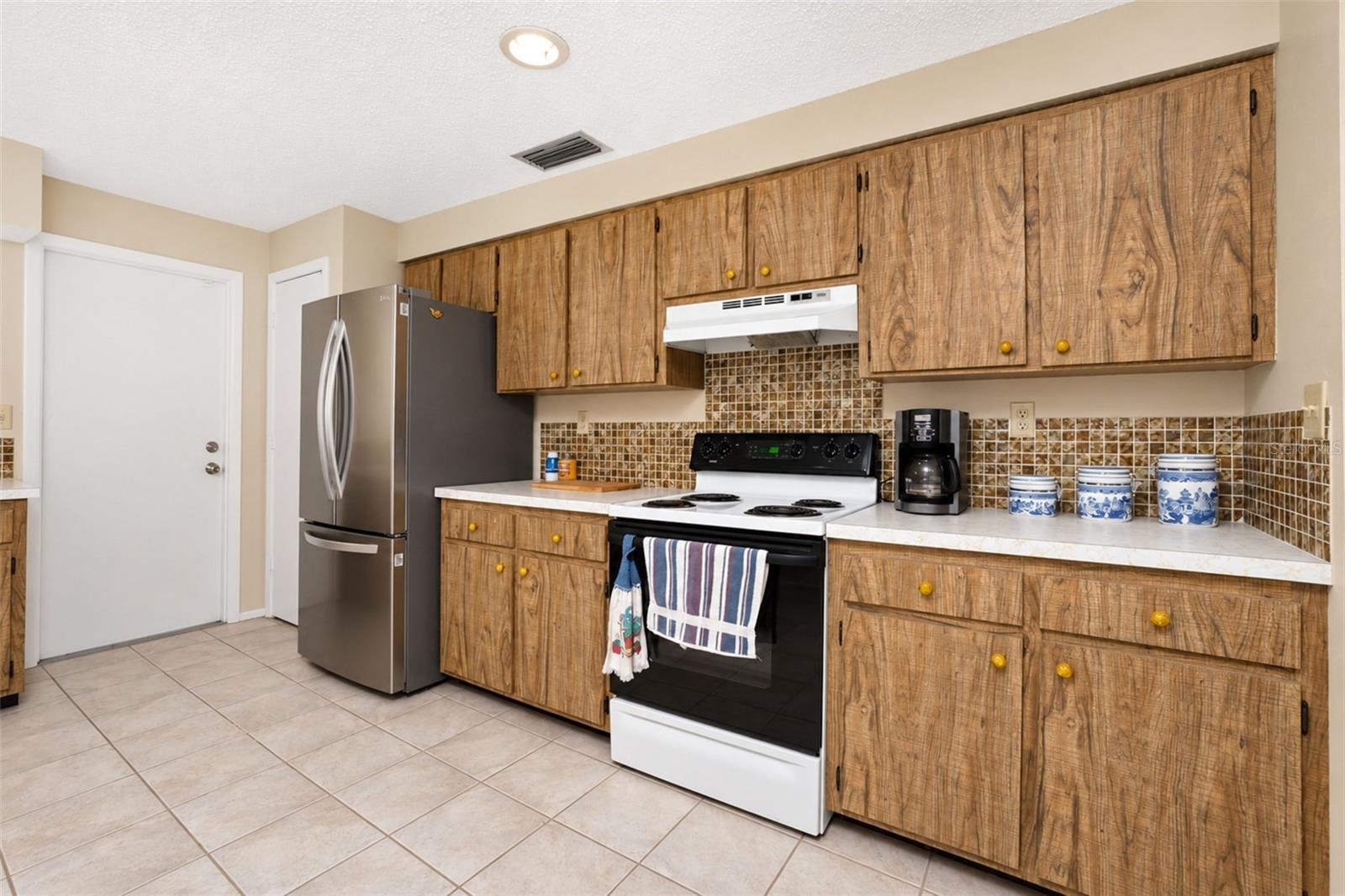 Kitchen leads to garage