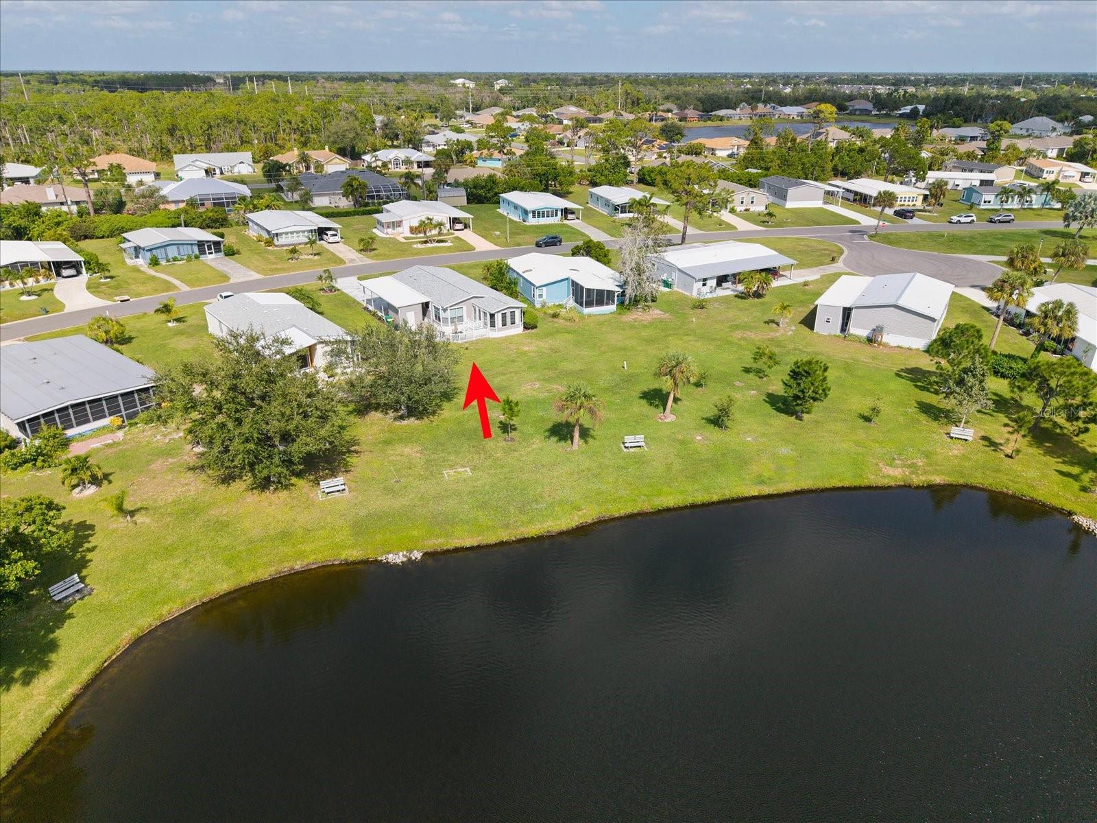 YOU OWN YOUR LOT WITH A LOW HOA FEE OF $200 A YEAR.