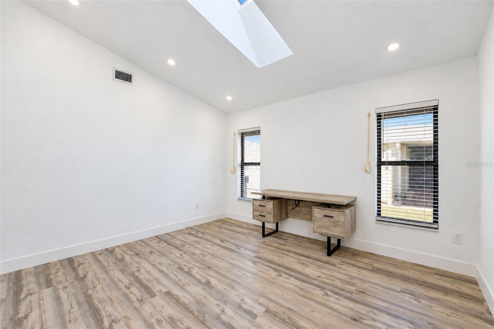 Separate office with French doors and skylight