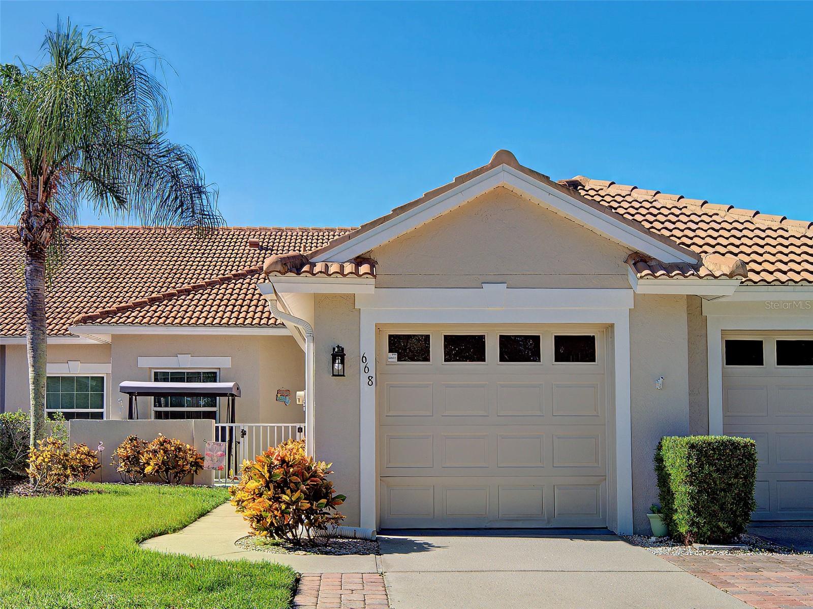 Front Entry with gated courtyard.