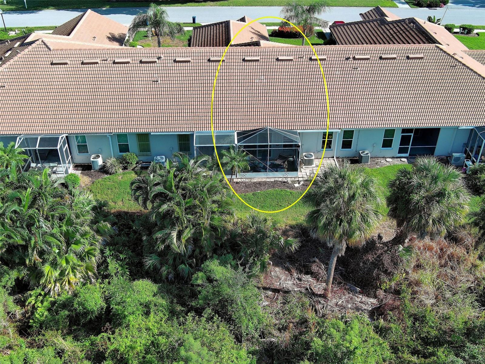 Aerial view of rear - this unit has a larger than most screened in lanai.