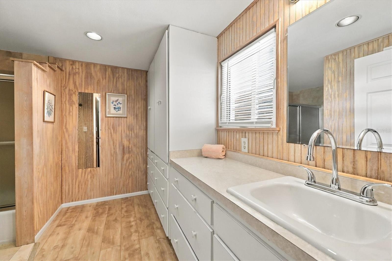 Ensuite bathroom - cabinets galore