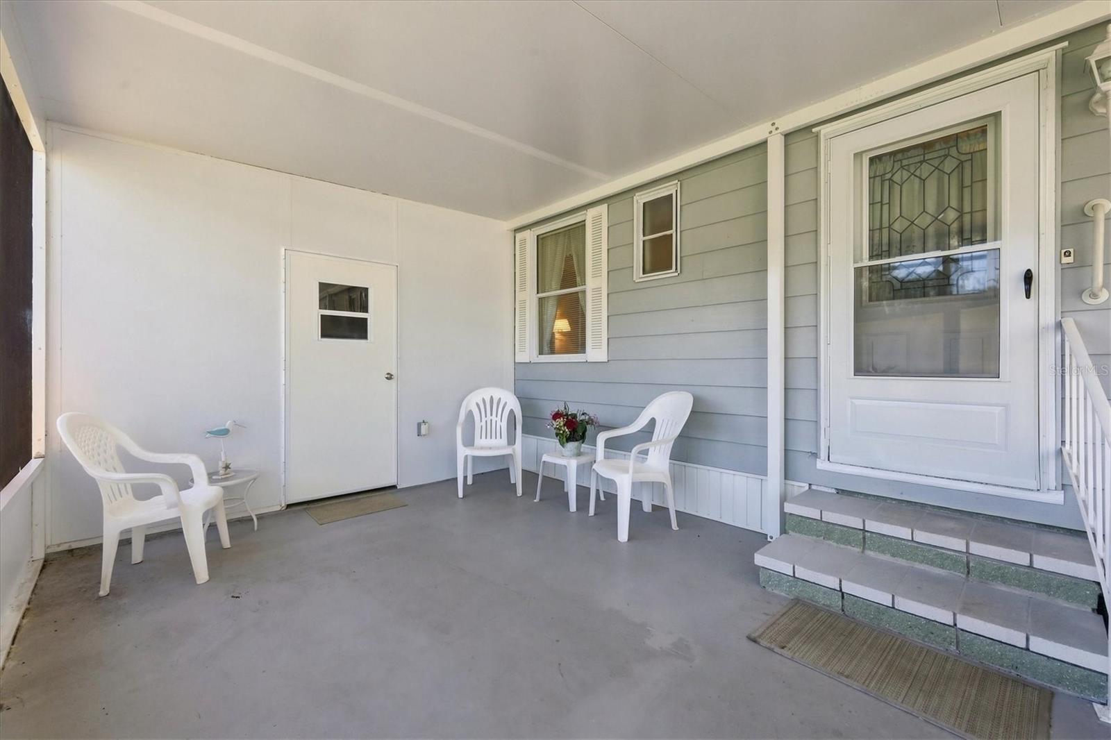 Shed entrance off carport
