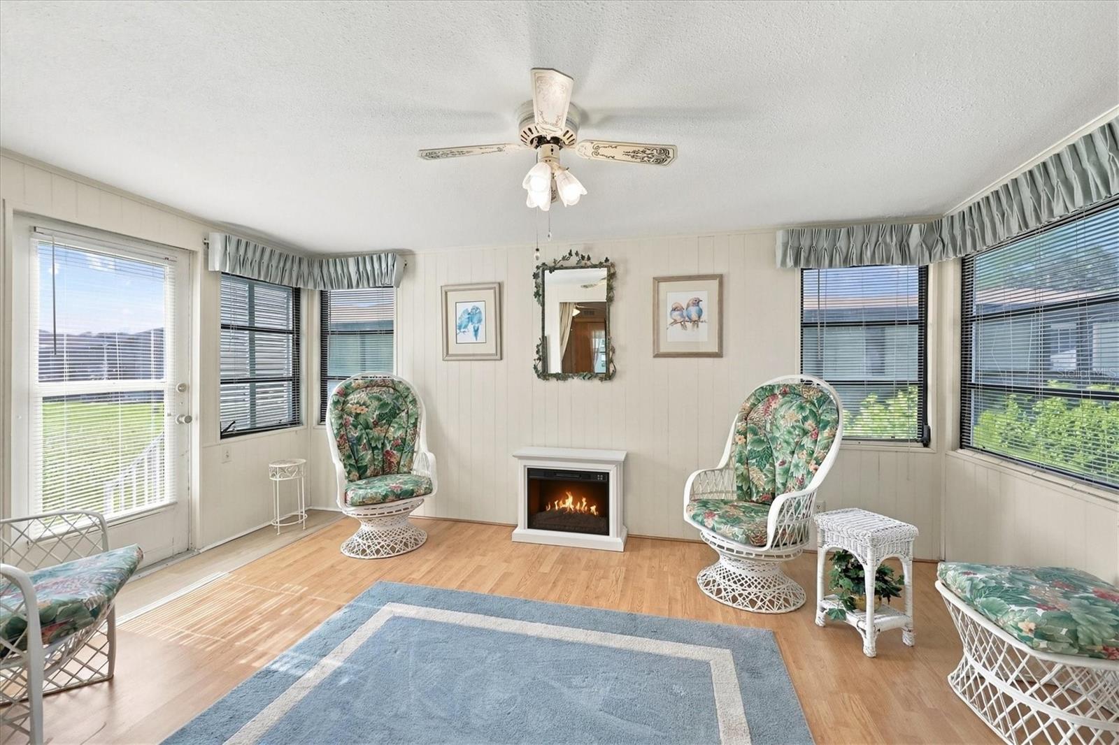 Florida room w/electric fireplace