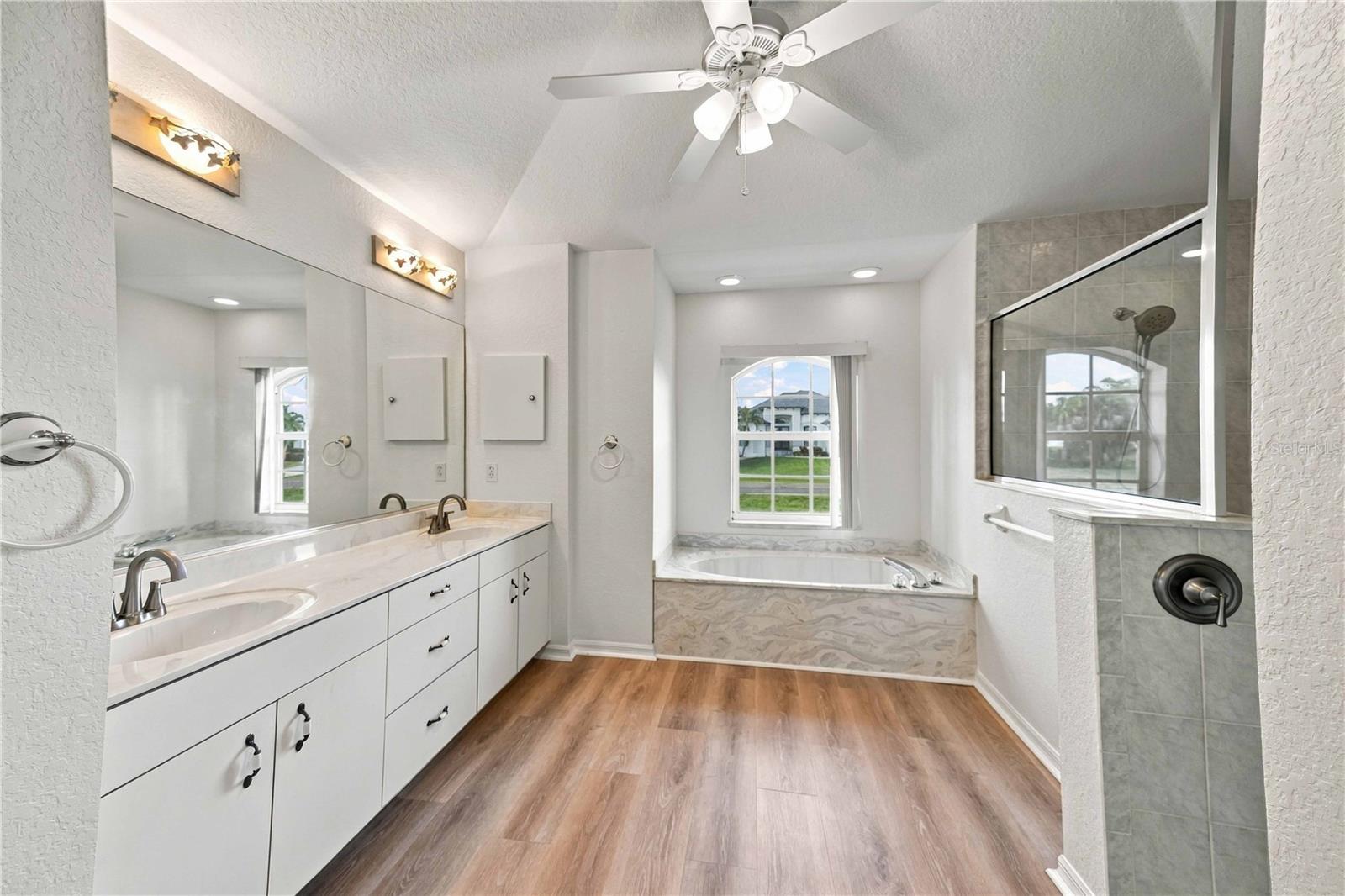 Primary bathroom with dual vanities