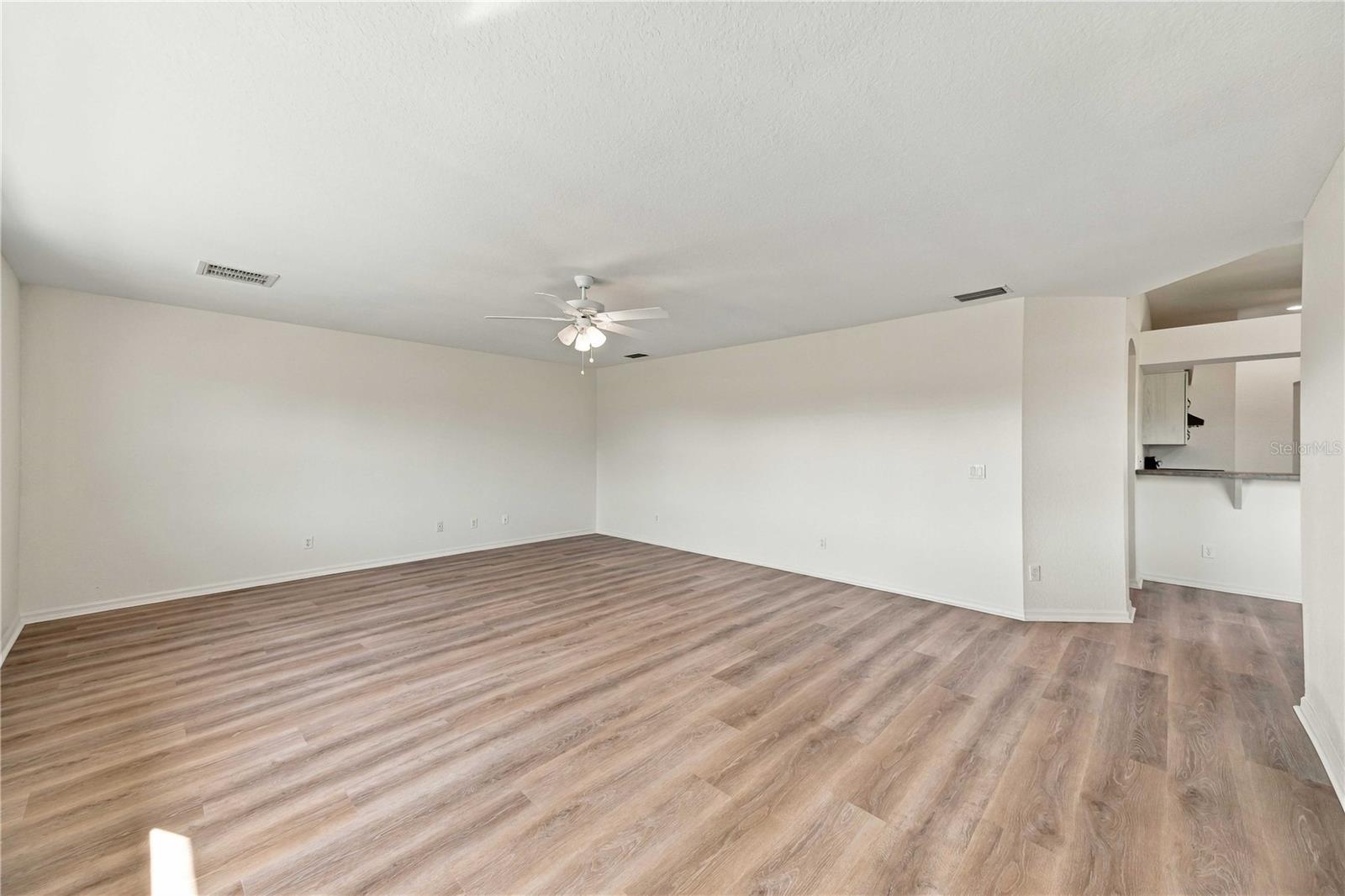 Family room with open flow to the rest of the home