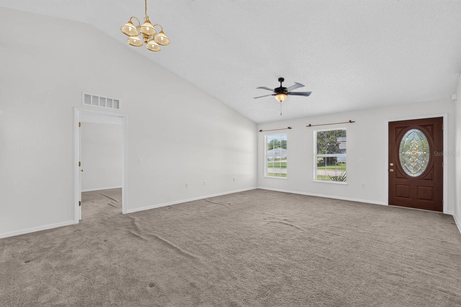 Front living room/dining room looking towards entrance