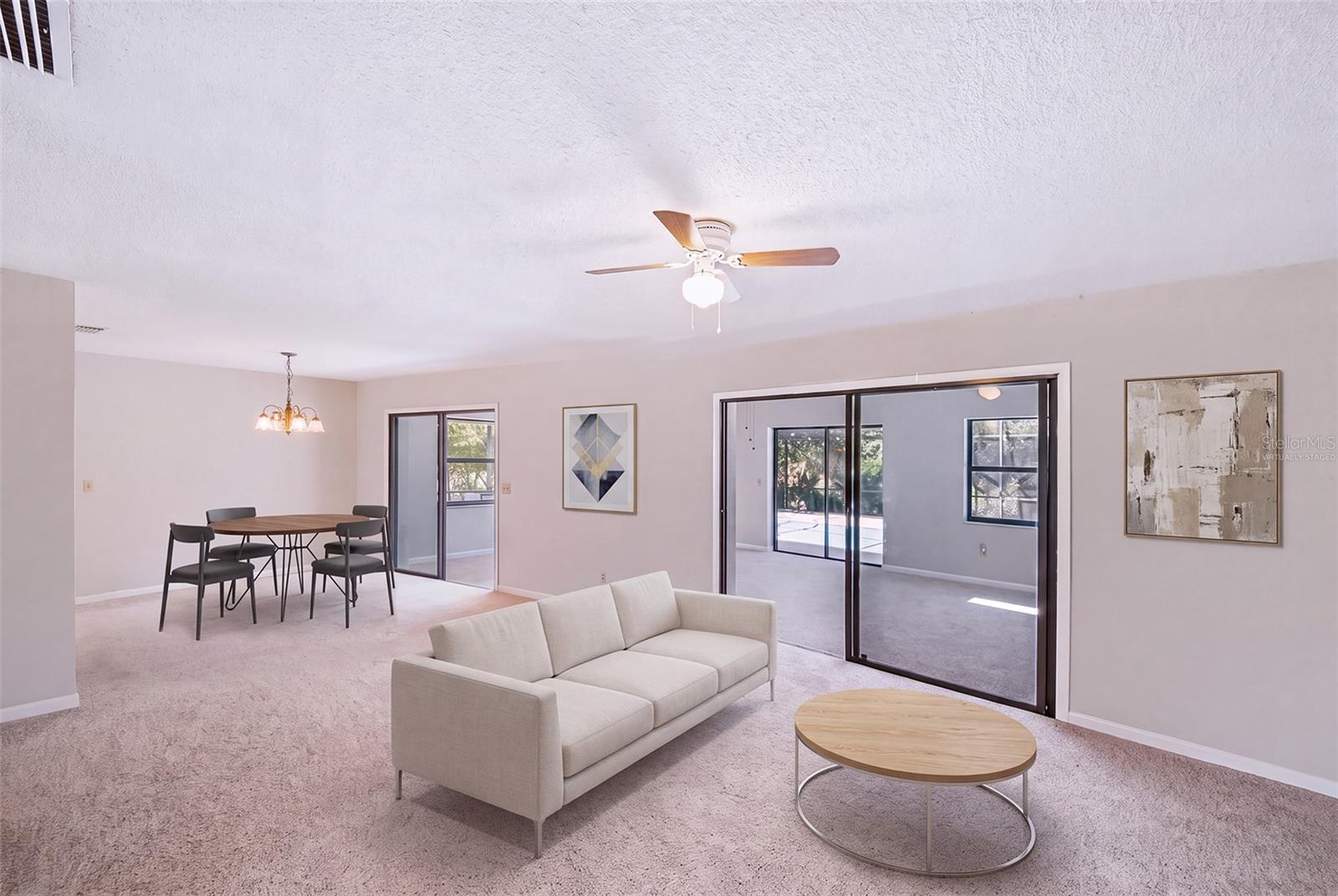 Virtually staged with furniture in dinette/living room area