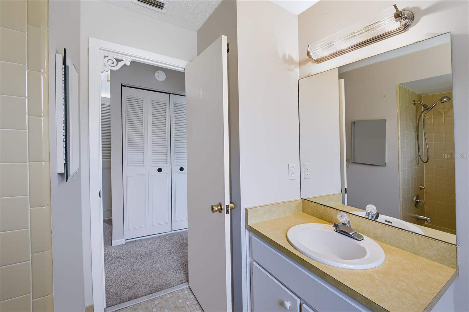 Another view of secondary bathroom, linen closet is behind entry door. There is also plenty of closet space in hallway!