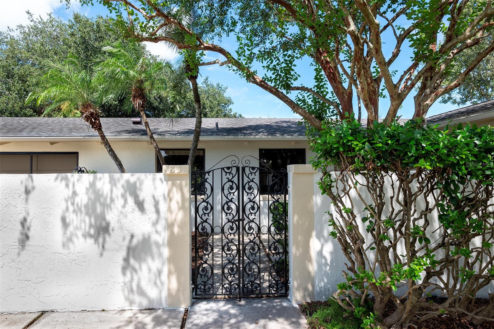 Gated small courtyard entry