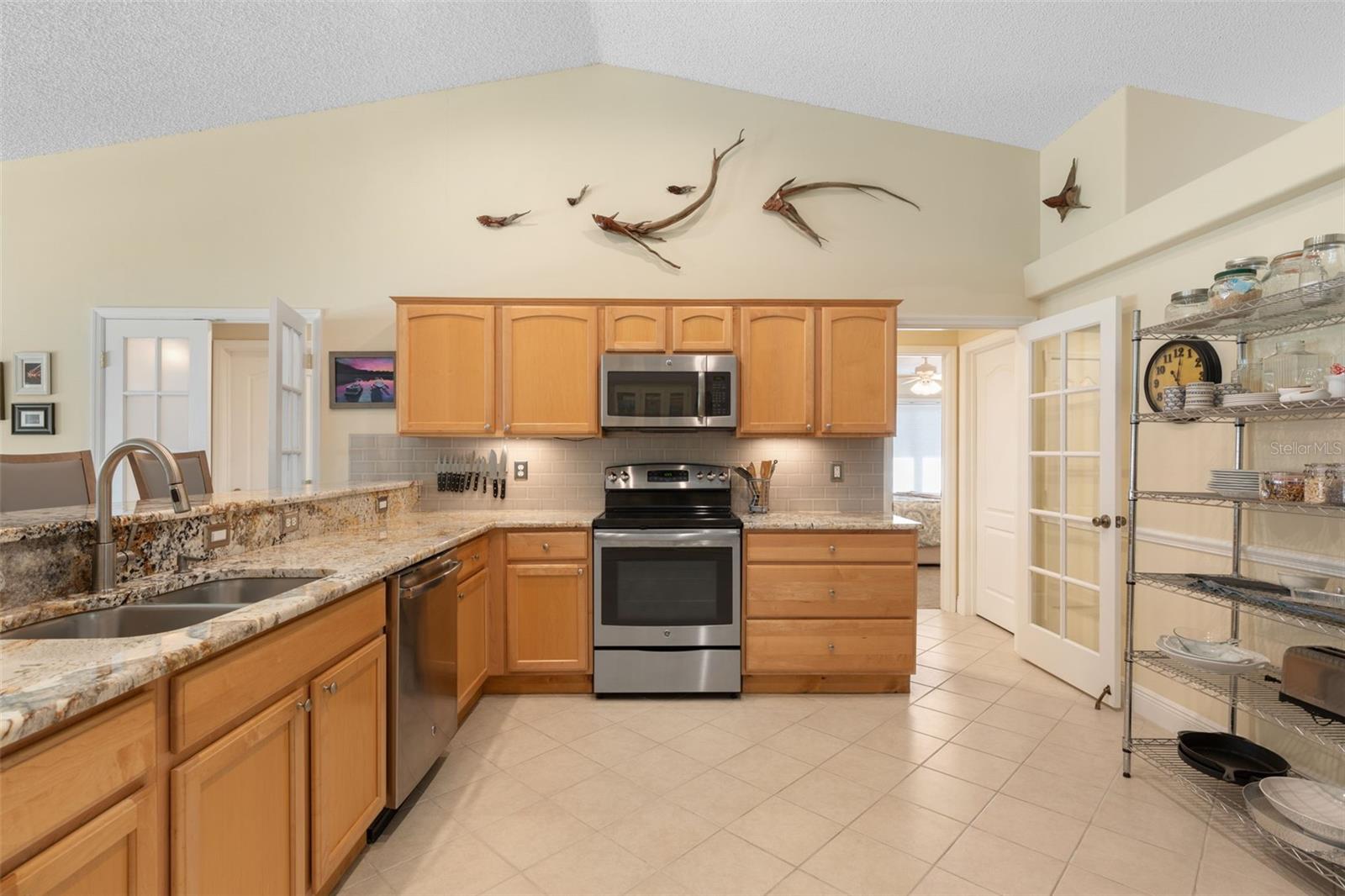 Everything has its place in this thoughtfully arranged kitchen, where ample storage keeps essentials close at hand and a practical layout makes everything from weeknight dinners to elaborate recipes a pleasure.