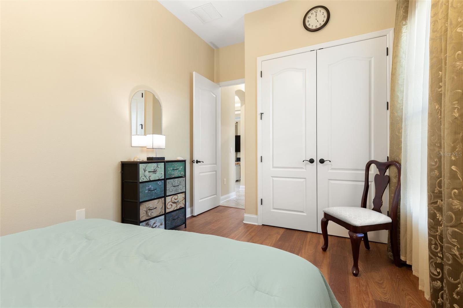 Another perspective of First-Floor Bedroom #2, highlighting its closet space and convenient location within the home.