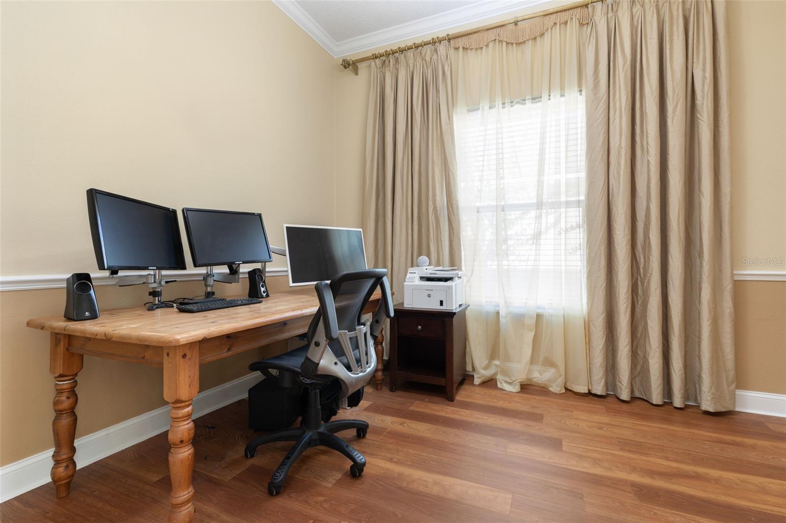A versatile office/den offering a flexible space for working from home, pursuing hobbies, or creating a room that suits your needs.