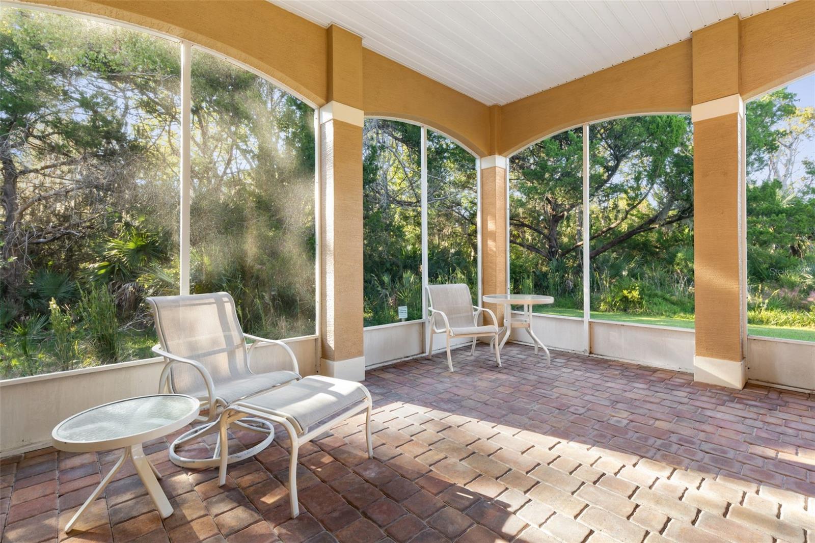 Relaxed indooroutdoor living on the spacious screened lanai with peaceful conservation views.