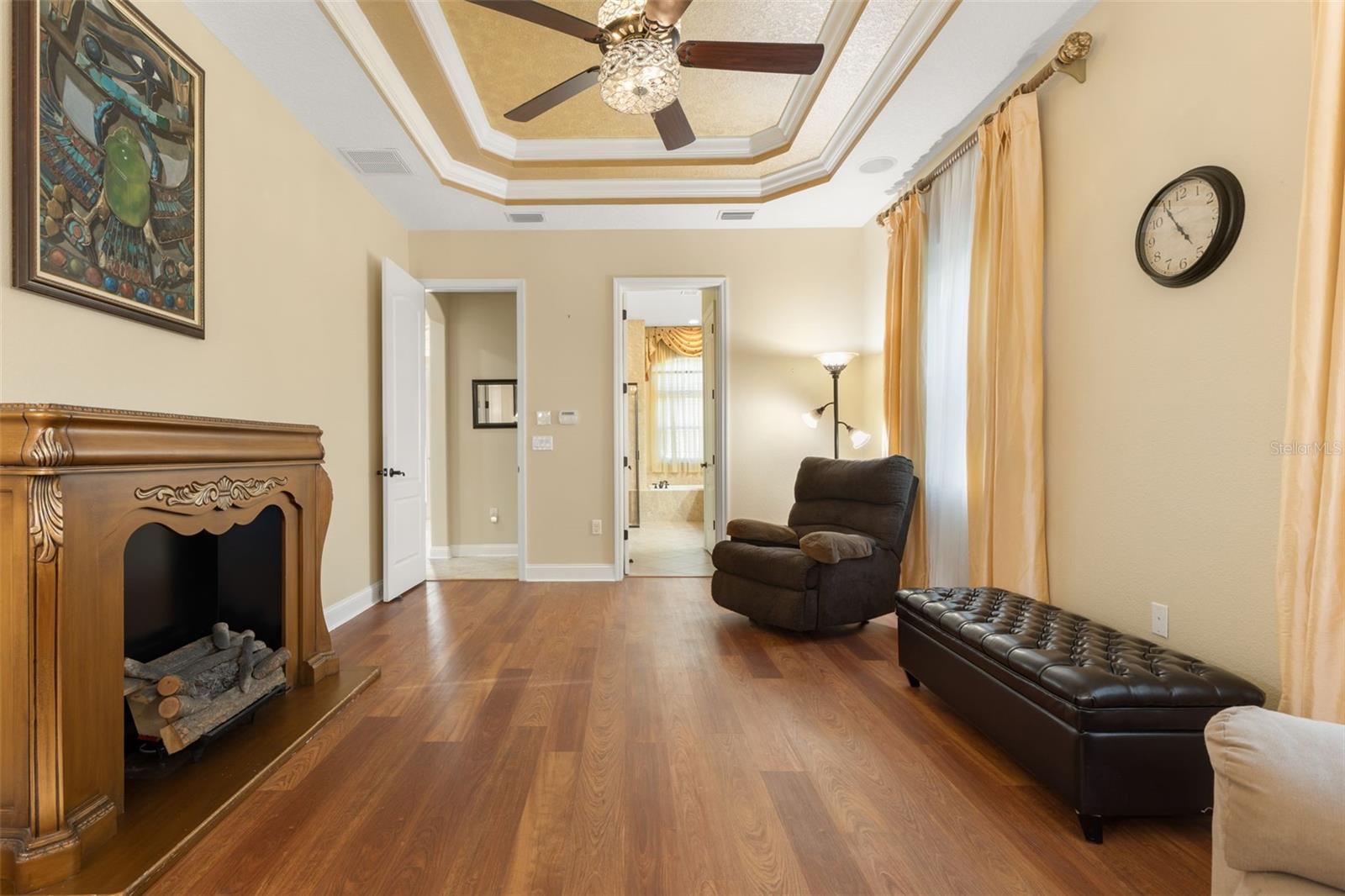 Another perspective highlights the generous floor space and convenient access to the adjoining primary bathroom.