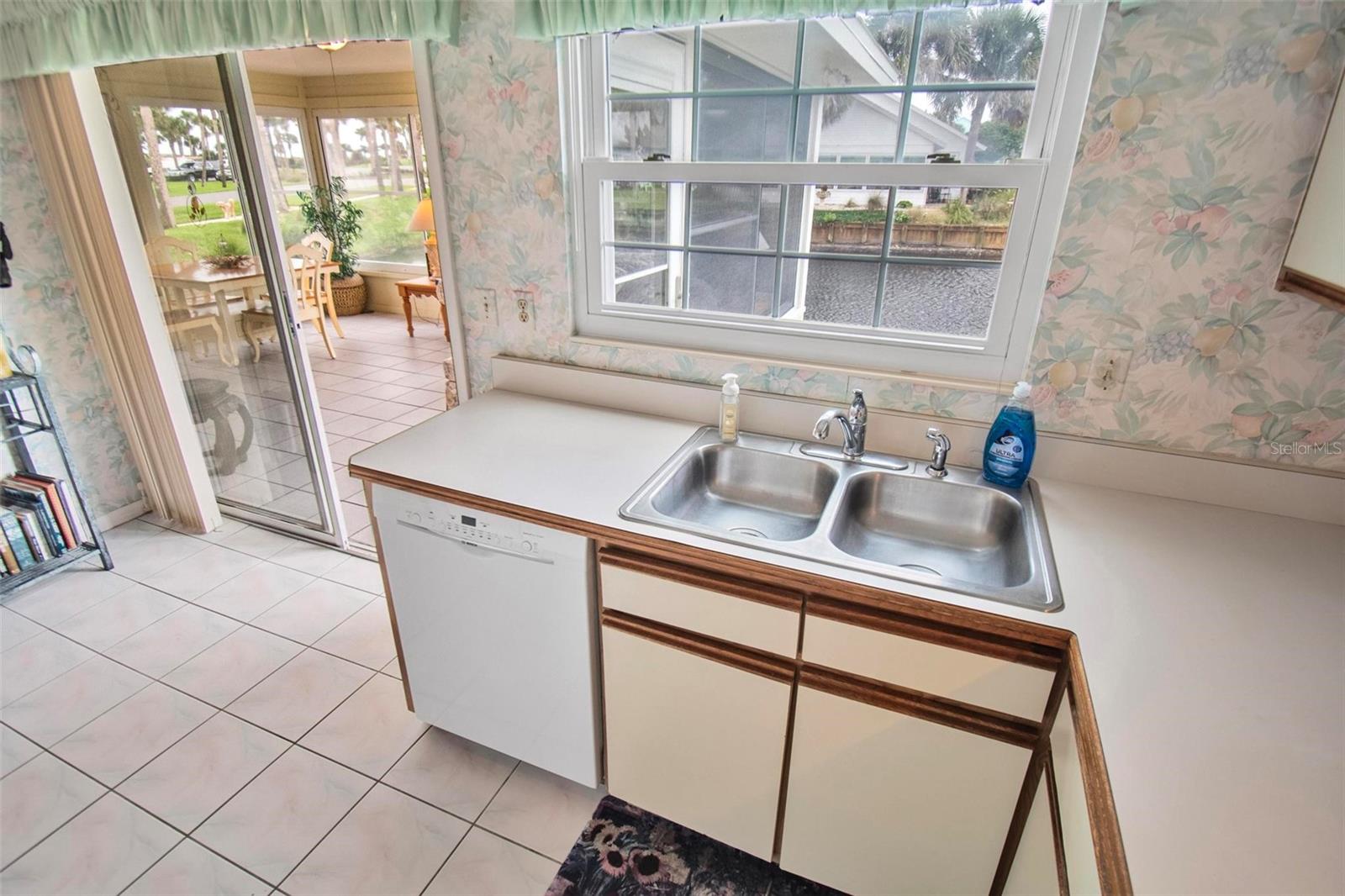 Slider opens to Florida room