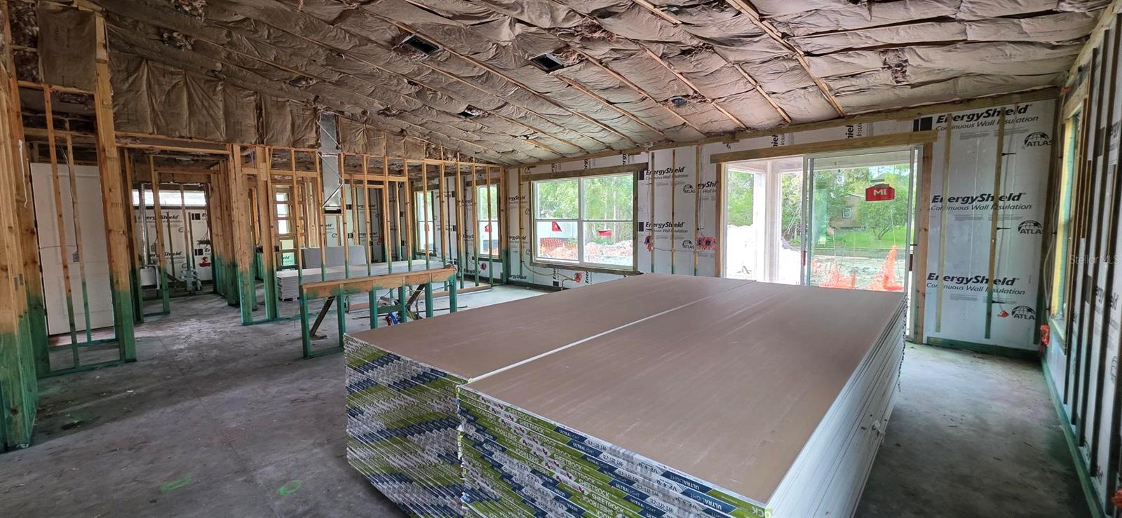 Bright and open plan looking out to pool and canal view