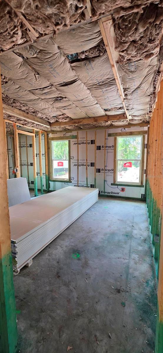 Primary bedroom, recessed ceiling, view of pool