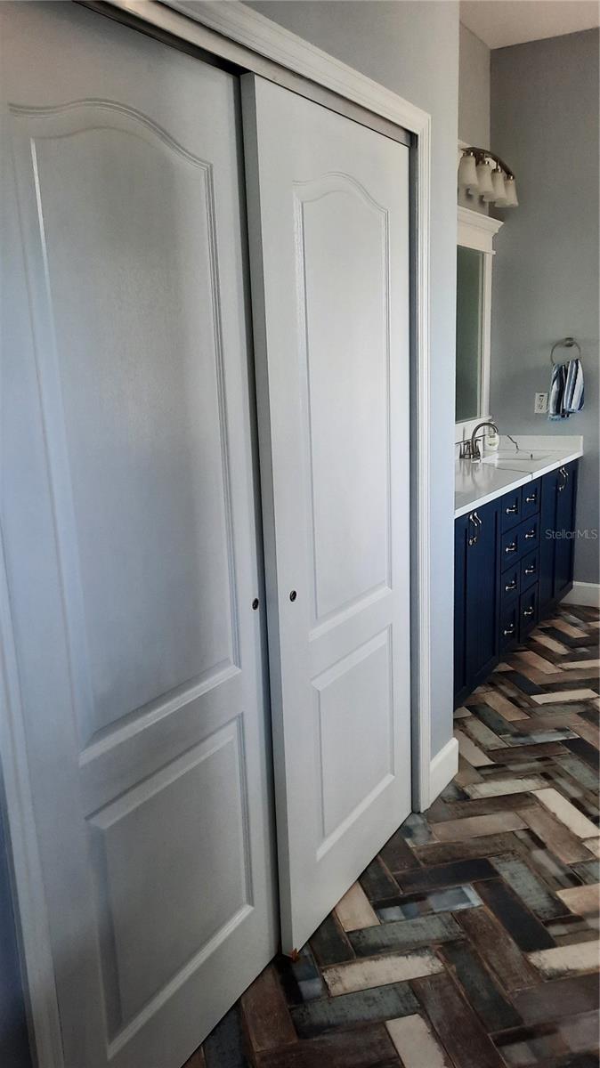Linen closet in primary bathroom