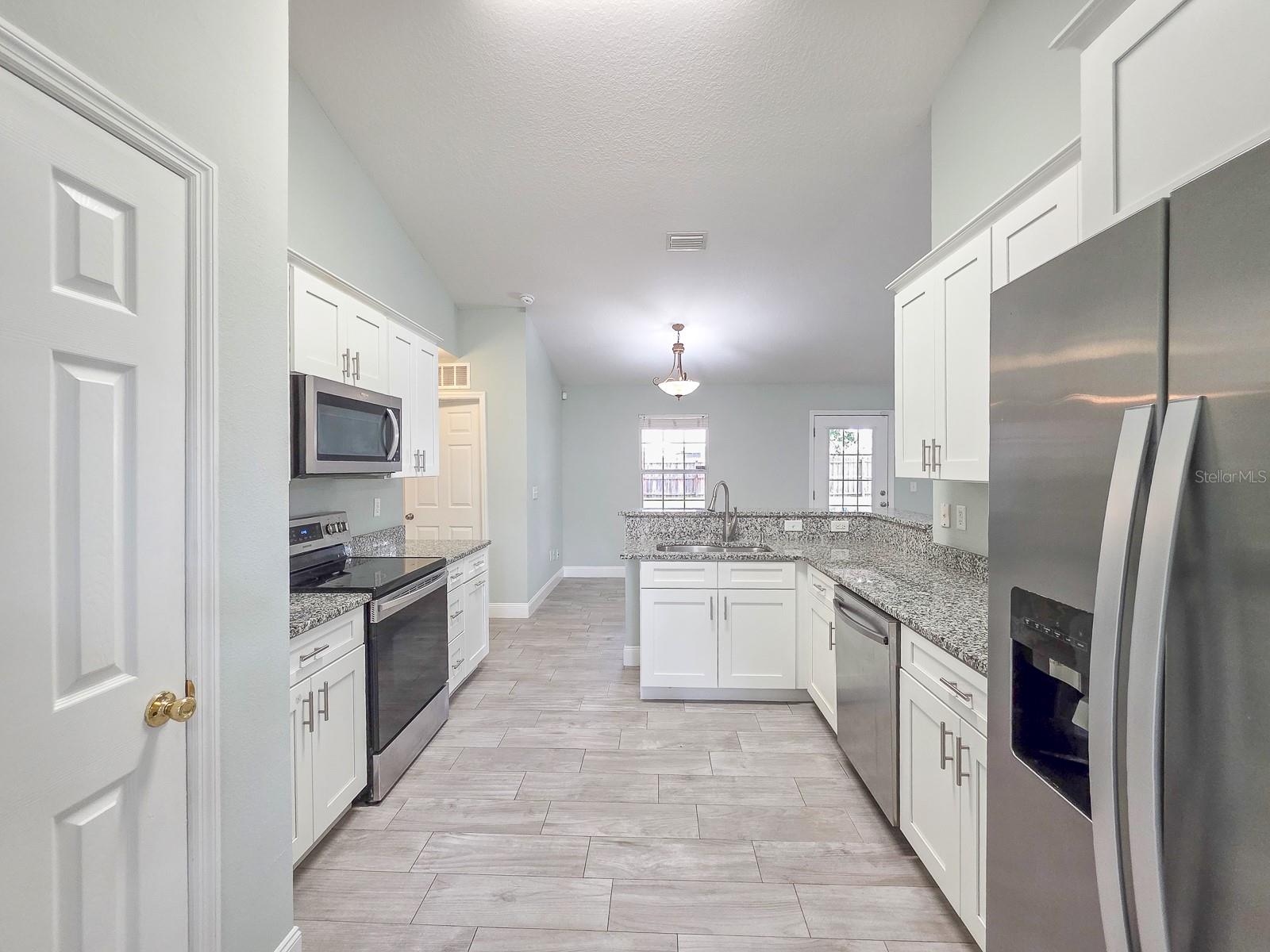 Kitchen with granite tops and pantry