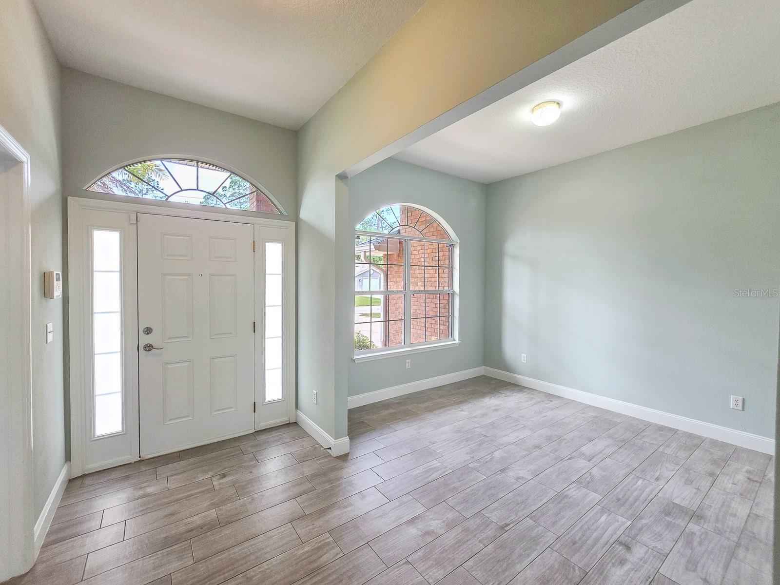 Sun filled entry and dining room