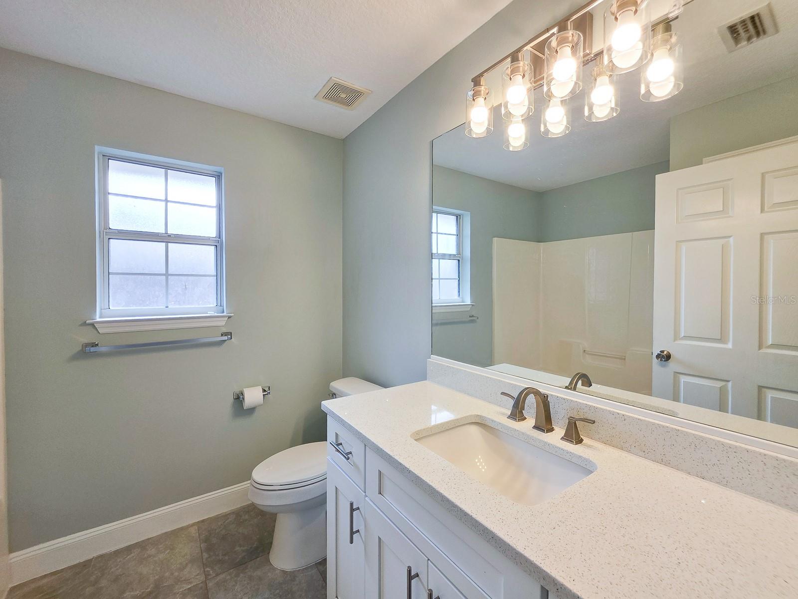 Shared bath with stone top