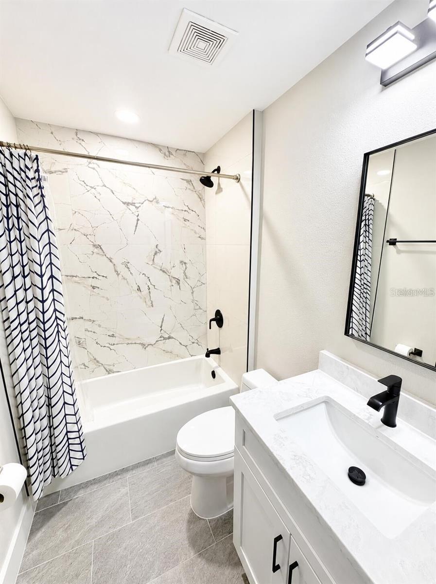 second bath full tub tile floors