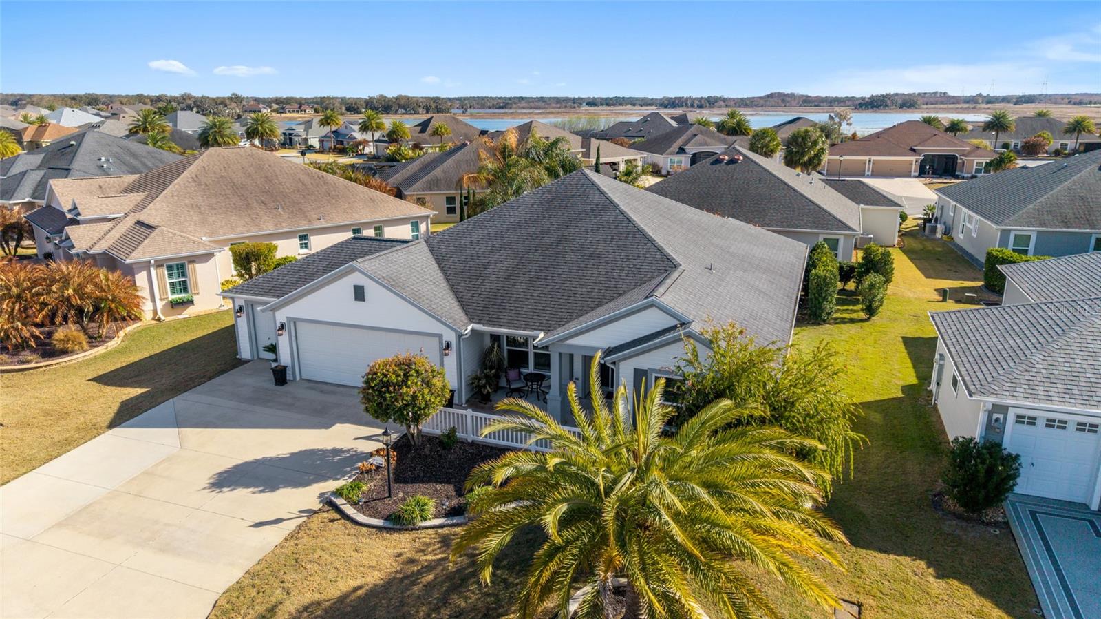 Two cars plus golf cart garage home, nestled in The Village of Pine Hills