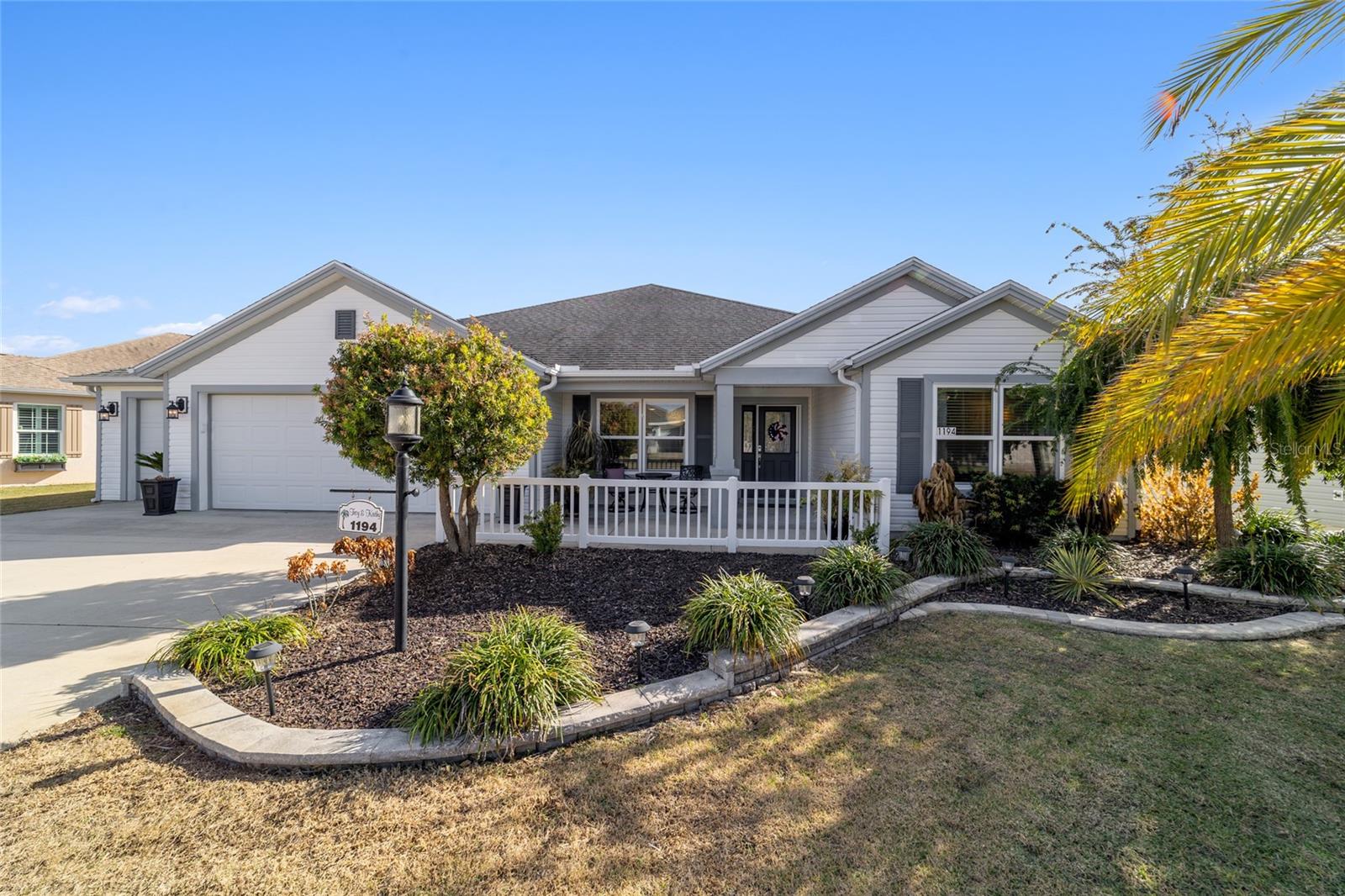 Enhanced landscaping compliments the exterior