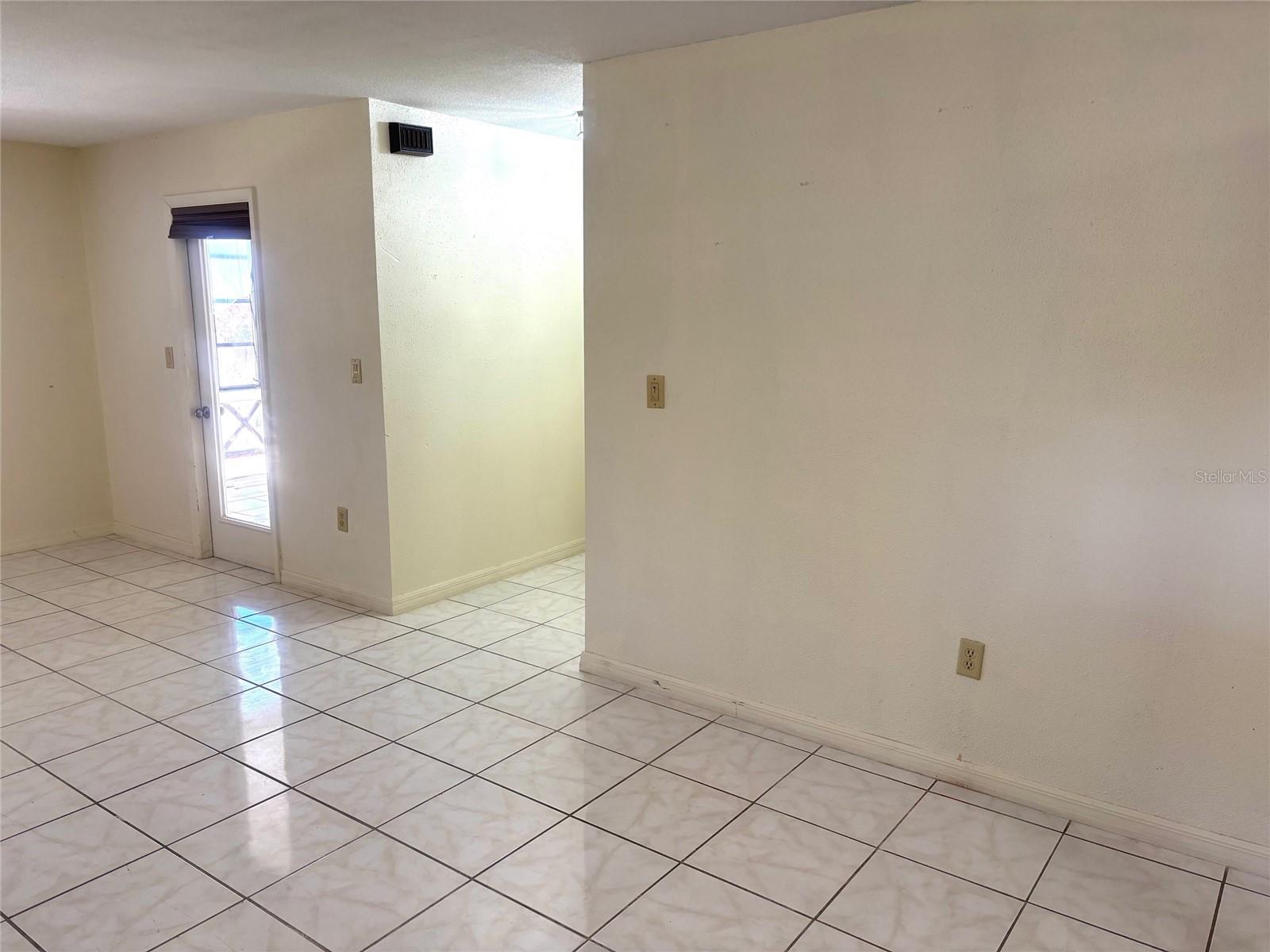 Looking back to the foyer and entrance to the condo
