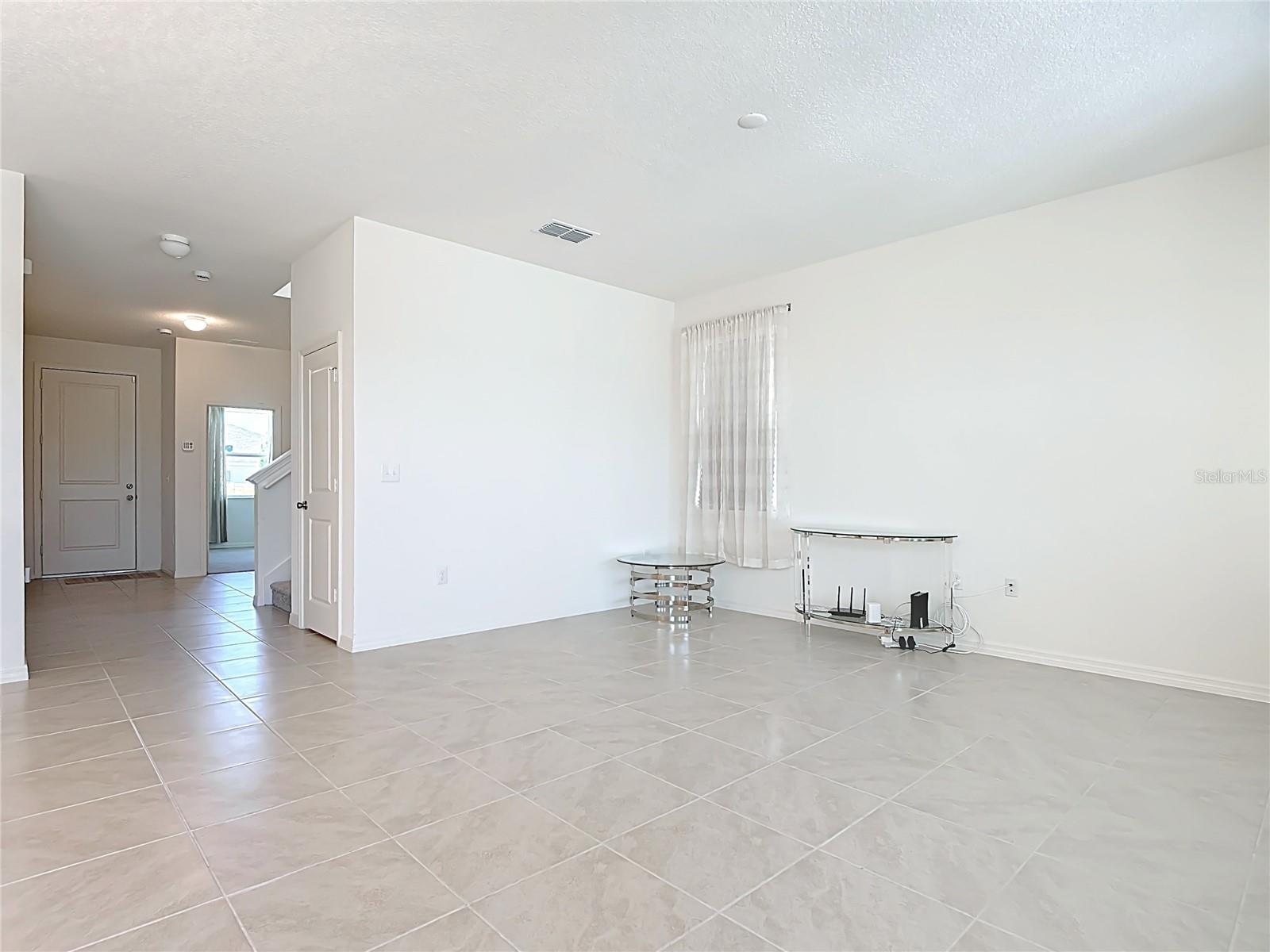Welcoming Foyer & Living Room area