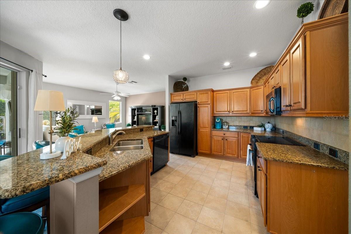 Ceramic Tile Floors & Wooden Cabinetry w/ Pull-Outs