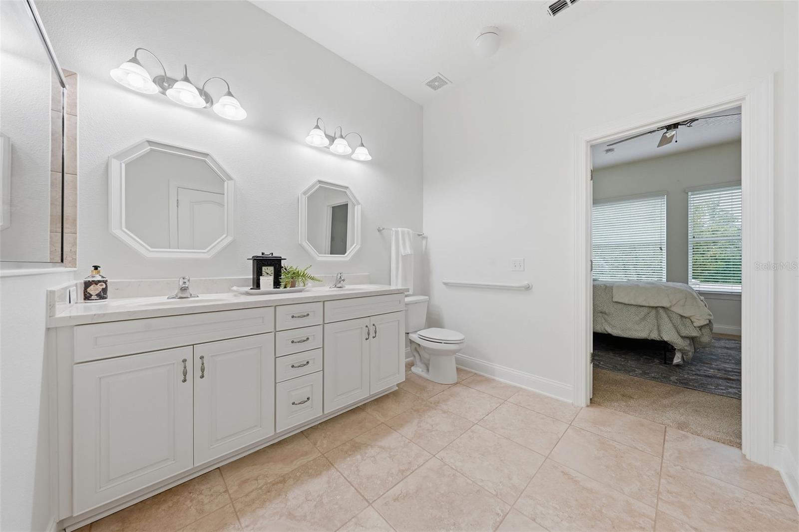 Primary ensuite with dual sink vanity