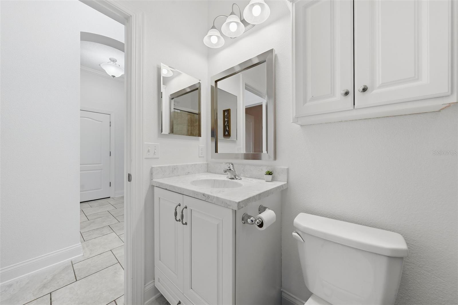Bathroom 3 features tiled walk-in shower