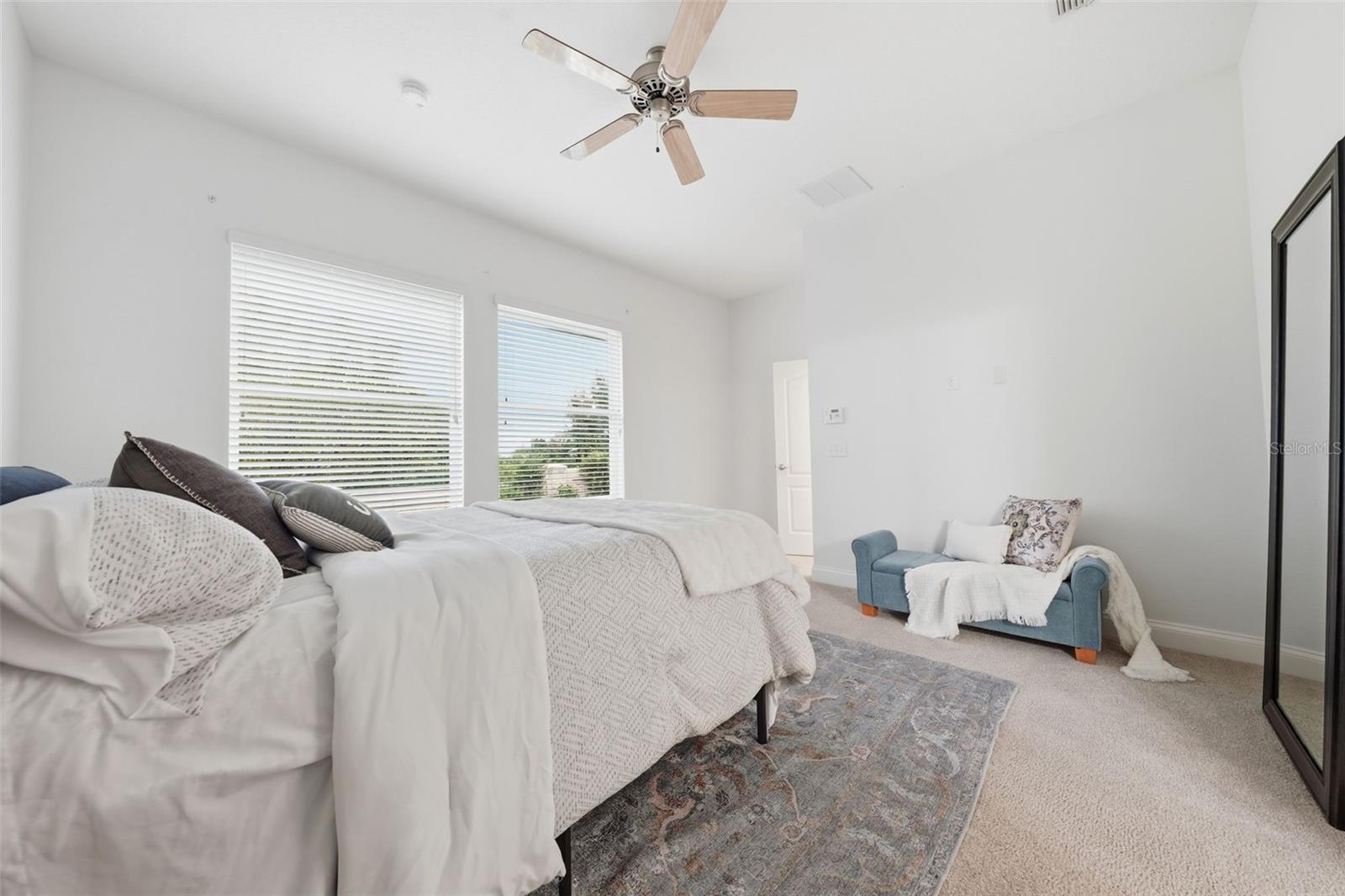 Primary Suite - windows offer hurricane shutters