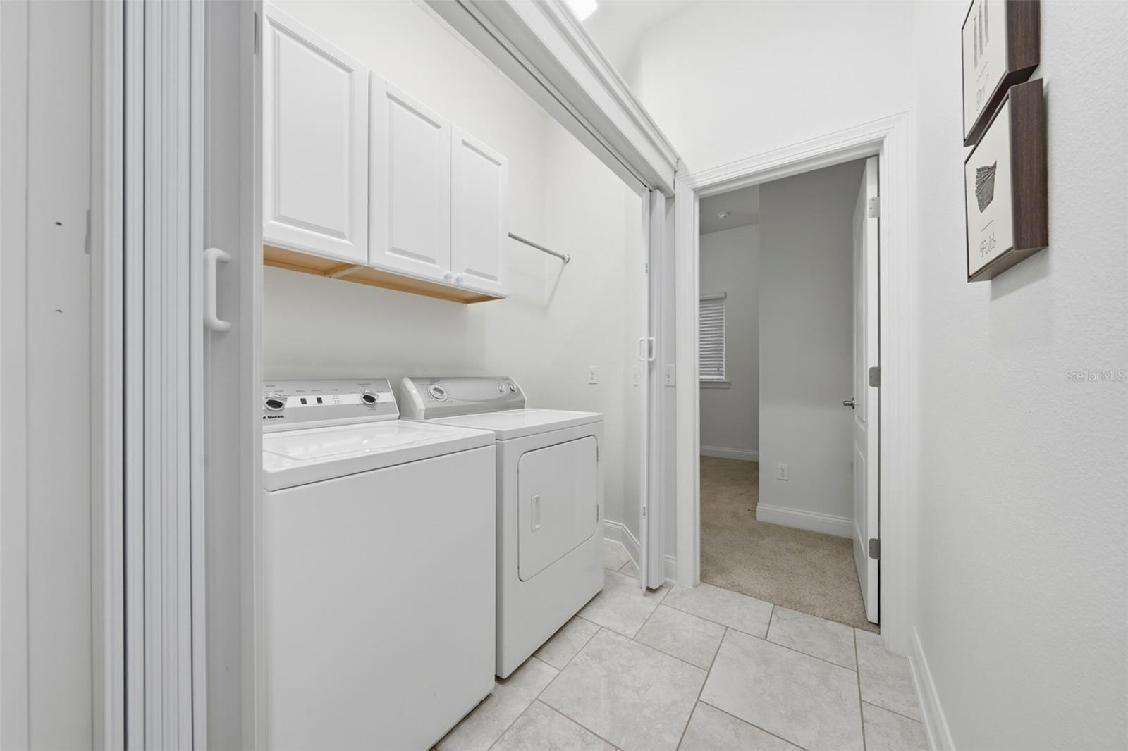 Laundry area leading into Guest Suite