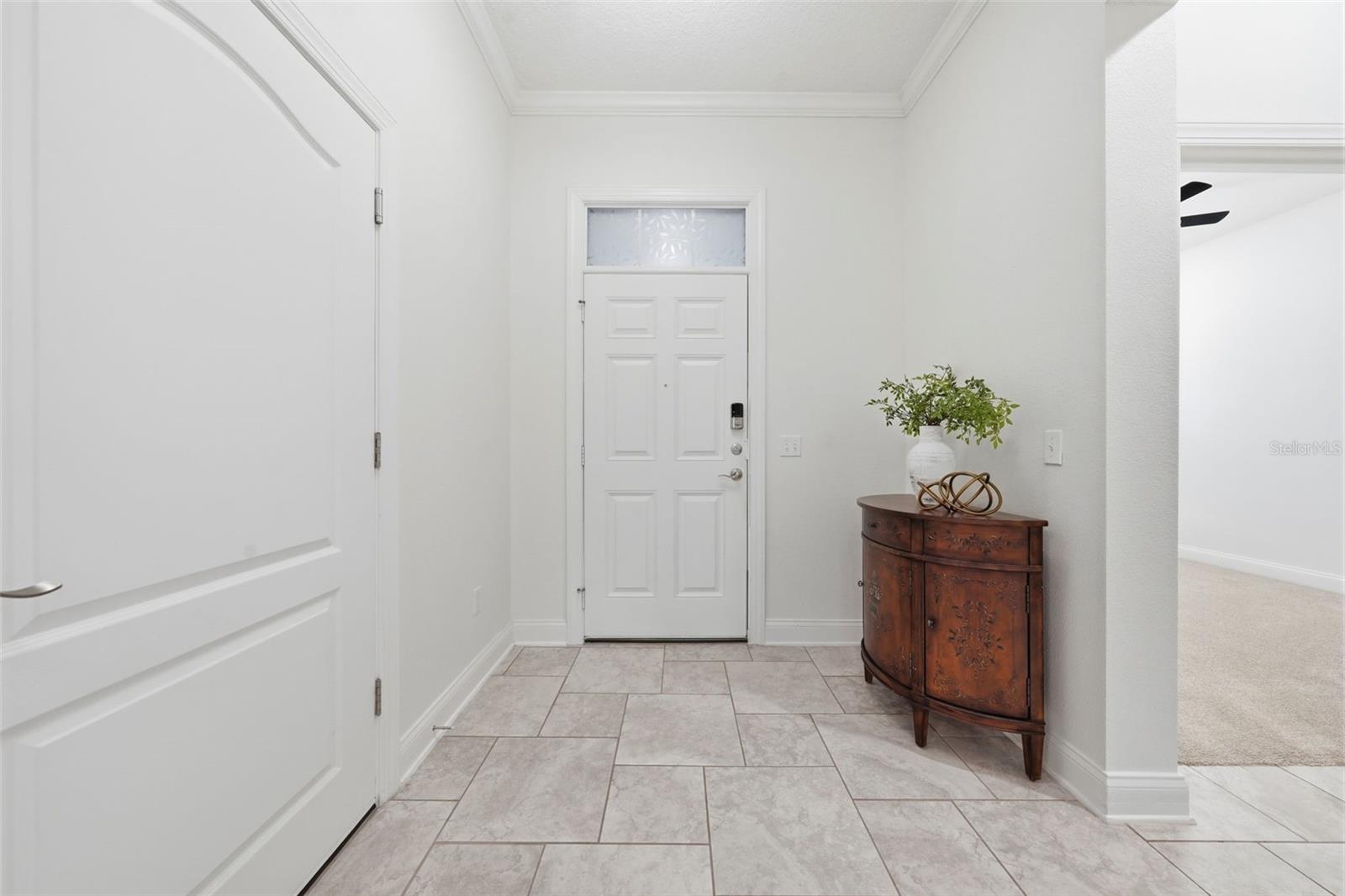 Foyer with garage entry to the left