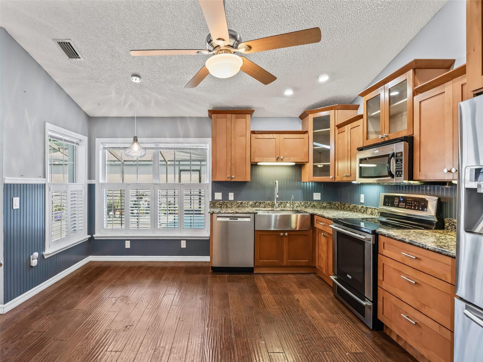 Kitchen w/Stainless Appliances & Plantation shutters