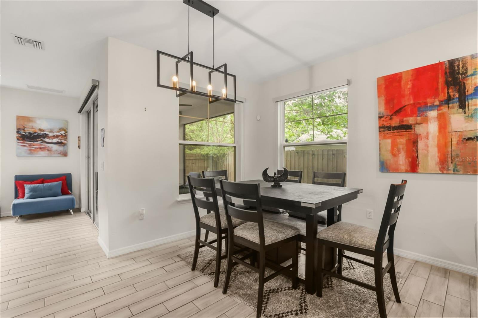 Dedicated dining area filled with natural light, offering the perfect space for everyday meals and entertaining. Dedicated dining area filled with natural light, offering the perfect space for everyday meals and entertaining.