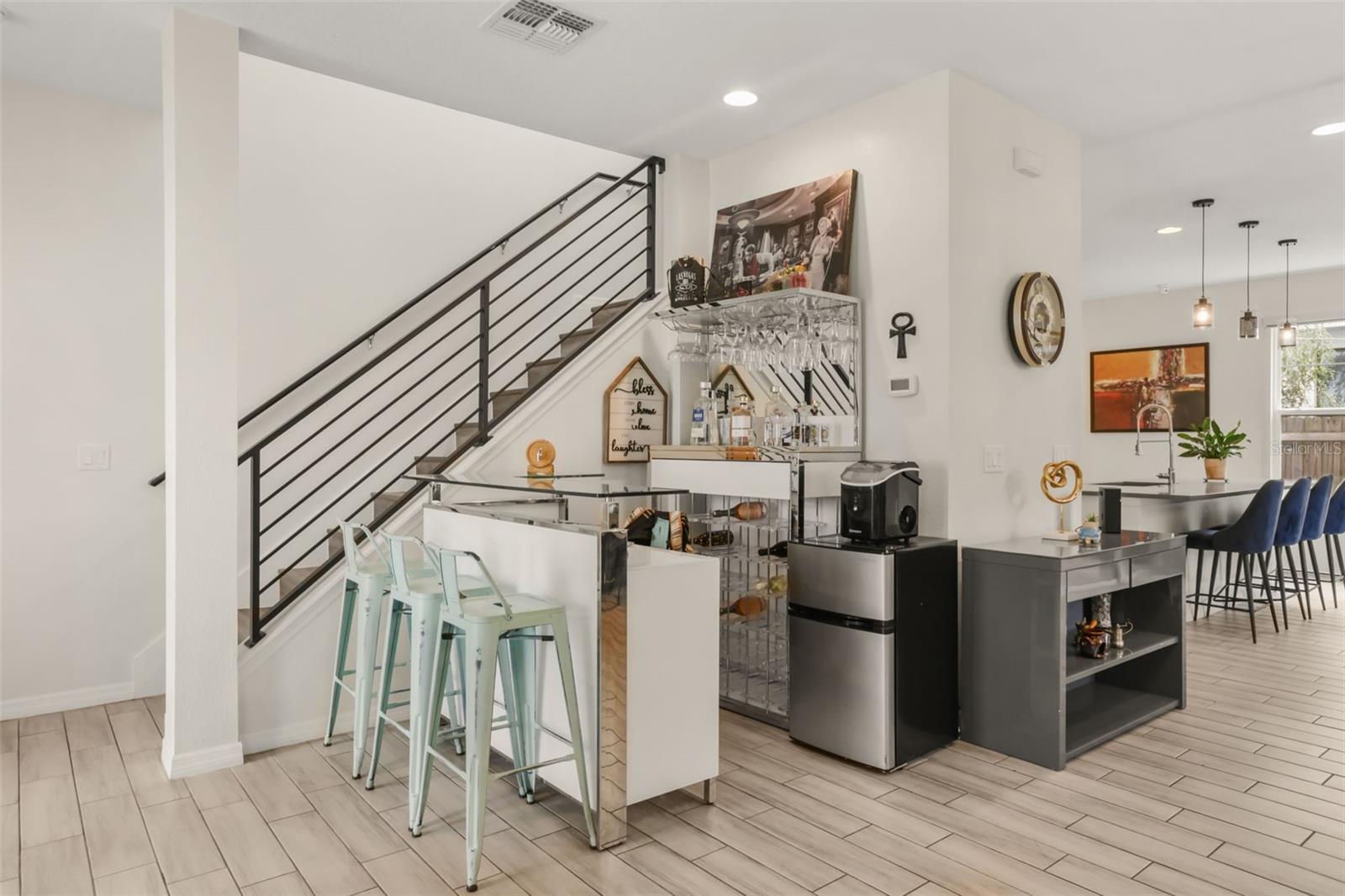 Stairs leading to the second story, where all bedrooms are located