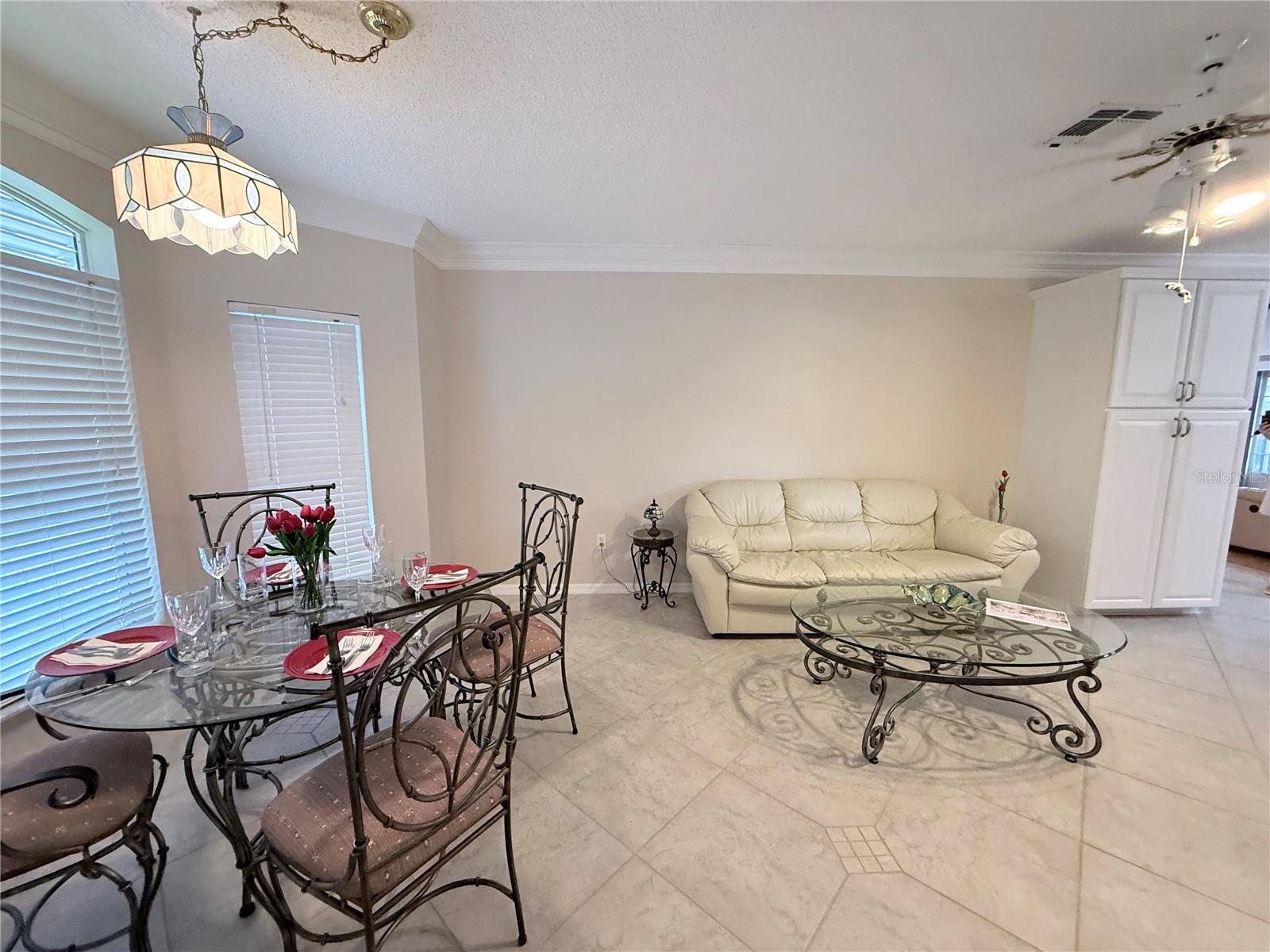 Dining table with golf course views in Keeping Room