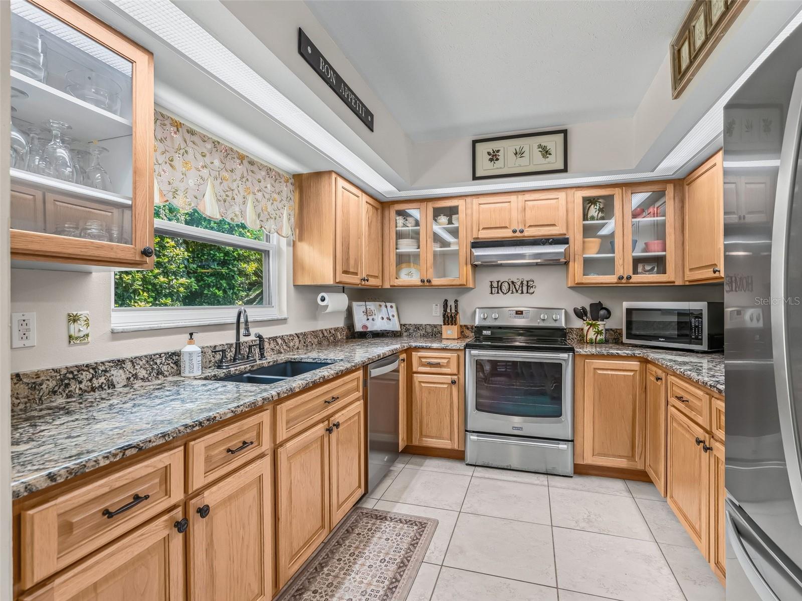 Kitchen with updated cabinets and granite