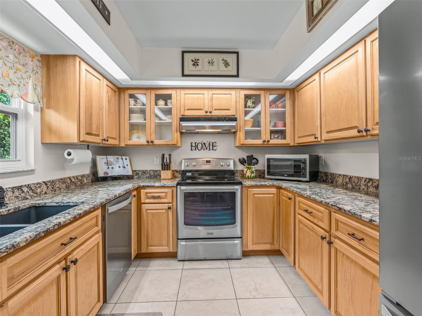 Kitchen with free standing microwave