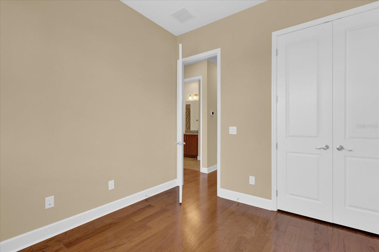 Additional view of bedroom 2, featuring ample closet space and easy access to the hall bath.
