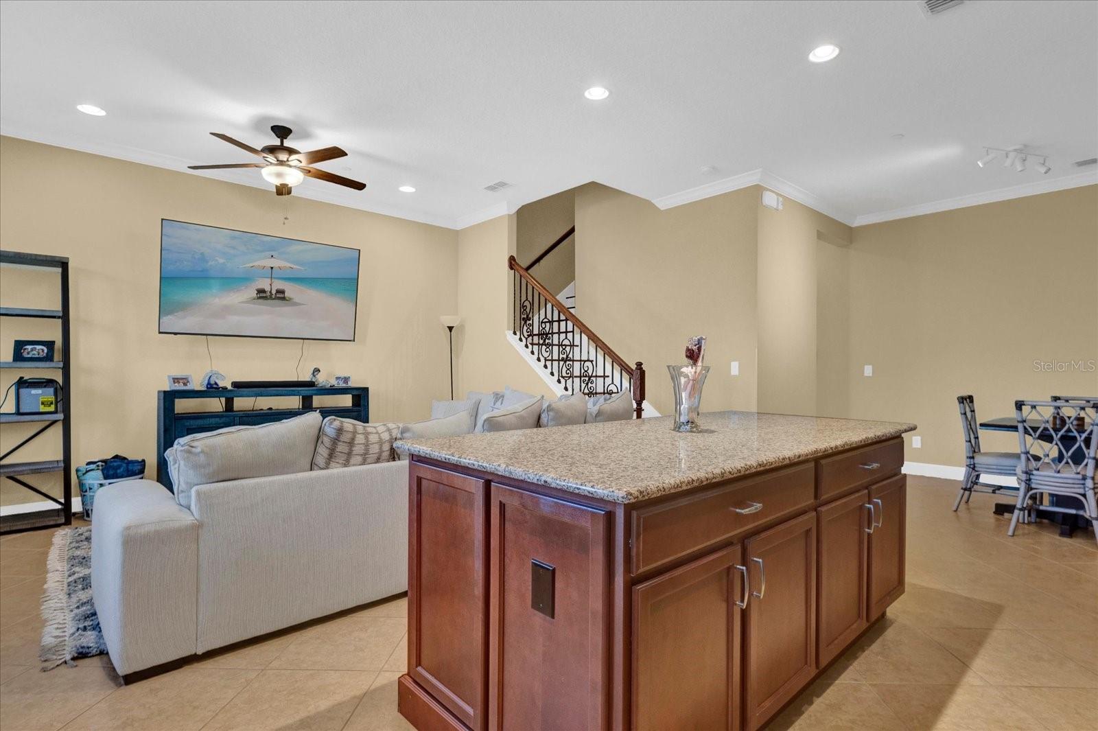 Open-concept living and kitchen area with a large center island  perfect for entertaining.