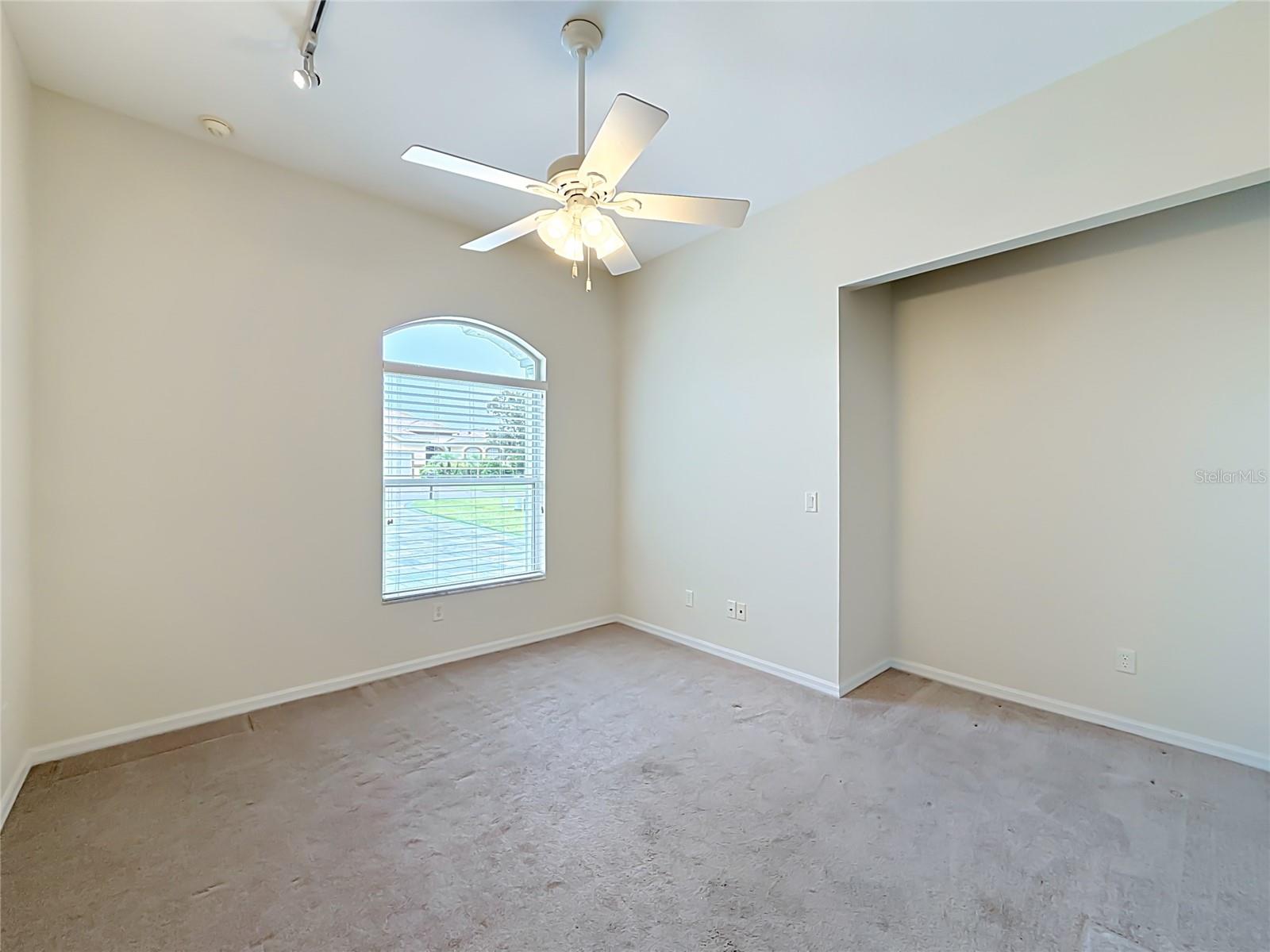 Bedroom 3 with built in closet space.