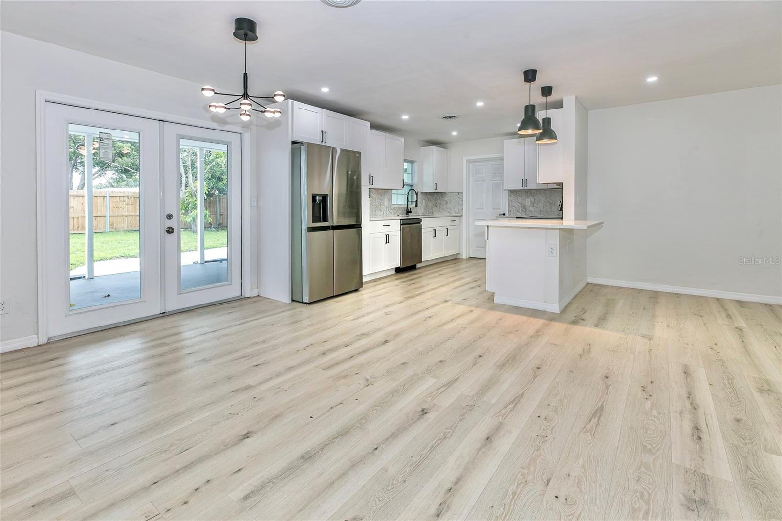 dining/kitchen and rear entrance door.